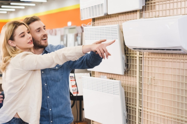 couple choosing ductless as attic air conditioner