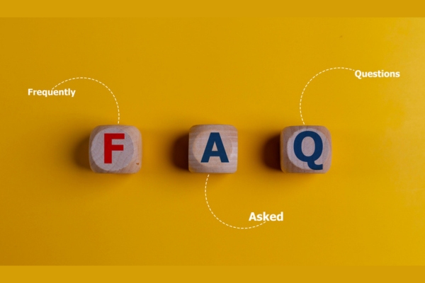 FAQ spelled using wooden letter cubes depicting generator frequently asked questions