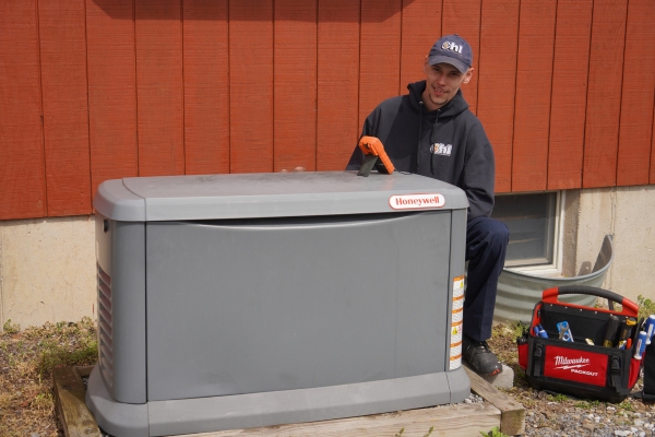 R.F. Ohl technician on site for Honeywell generator maintenance